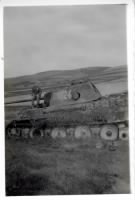 Pvt. Ralph Thomas Bowers on German Mark VI tank in Bebra, Germany 1945 