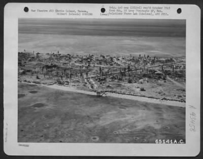 Thumbnail for General > This Aerial View Showing Bomb Damage On Betio Island, Tarawa, Gilbert Islands, Was Taken From A Navy Pby - Two Weeks After The Island Was Captured From The Japanese.  4 Dec 1943.