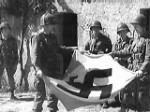United States 101st Airborne takes down Nazi flag