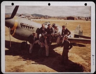 General > China....Curtiss P-40 Pilots Of The 26Th Fighter Squadron, 51St Fighter Group, Discuss A Mission.  They Are (From Left Standing) Major Edward M. Mollmeyer, Lieutenants Joseph K. Bavuso And Von C. Weller Jr.; (Seated) Lieutenants John W. Sherak, Douglas H.