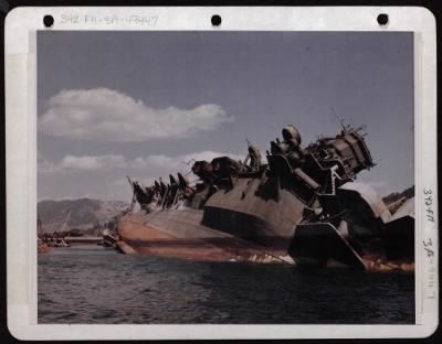 ␀ > Beached Japanese Amcigi Naval Vessel Along Inner Harbor Of Kure, Japan.  March 1946.