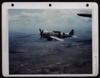 A Republic P-47 Thunderbolt Carrying General Purpose Bomb Heads For The Target At Santiago, North Luzon, P.I. - Page 1