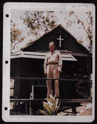 Thumbnail for ␀ > Major Michael J. Lyons, 5Th Air Force Chaplain, From Syracuse, New York, Shown Here On The Porch Of His Office-Quarters Which He Built At A Base In New Guinea.