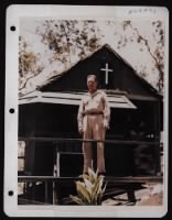 Major Michael J. Lyons, 5Th Air Force Chaplain, From Syracuse, New York, Shown Here On The Porch Of His Office-Quarters Which He Built At A Base In New Guinea. - Page 1