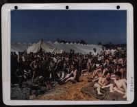 Air Corps And Ground Forces Who Have Been Prisoners Of War At Moosberg, Germany Relax In The May Sunshine Awaiting Their Turn To Be Evacuated By Us 9Th Troop Carriers. - Page 7
