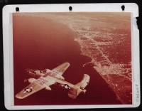 High Angle View Of A B-25, Bearing A Triumphant Slogan 'Finito Benito, Next Hirohito', Flying Over The Gulf Of Naples. - Page 1