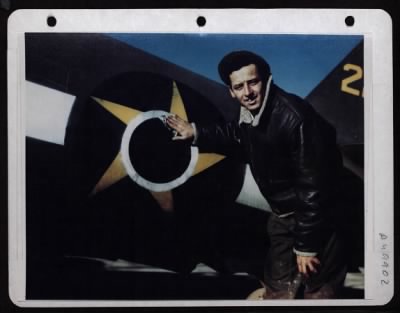 Thumbnail for ␀ > Sgt. Manuel Goulart Ferreira.  Rua Antonio De Padua #27, Rio De Janeiro (Lst Brazilian Fighter Squadron) Proudly Polishes The Insignia On A P-47 Thunderbolt.  Italy.