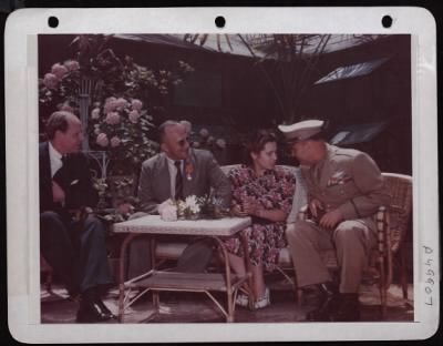 Thumbnail for ␀ > Lt. Gen. Ira C. Eaker Chats With M. And Mme. Bogomolov In Italy.