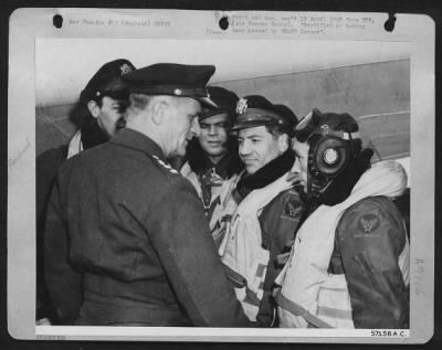 Consolidated > Inspection By Air Chief - Gen. Carl A. Spaatz, Commanding General Of The U.S. Strategic Air Forces In Europe, Shakes Hands With Crewmen Of An Air Sea Rescue Plane, After Completing An Inspection Of Their Plane And Equipment And Discussing Their Job With T