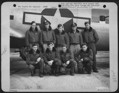 Consolidated > Lt. Peterson And Crew Of The 359Th Bomb Squadron, 303Rd Bomb Group, Beside A Boeing B-17 Flying Fortress.  England, 13 March 1945.