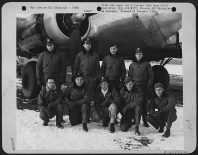 Consolidated > Lt. Bentley And Crew Of The 360Th Bomb Squadron, 303Rd Bomb Group, Beside A Boeing B-17 Flying Fortress.  England, 28 January 1945.