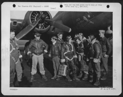 Consolidated > Crew Of The 388Th Bomb Group Beside The Boeing B-17 "Flying Fortress" 'Cock O' The Walk'.  England, 26 November 1943.  Standing, Left To Right Are: 2Nd Lt. John B. Dewey, Jasper, Ohio; S/Sgt. Joseph F. Pasquale, Akron, Ohio; T/Sgt. John C. Piazza, Dorches