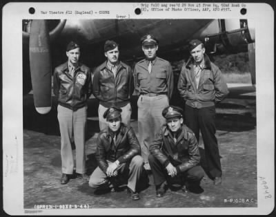 Consolidated > Operations Staff Of The 326Th Bomb Squadron, 92Nd Bomb Group, Beside A Boeing B-17 Flying Fortress.  England 2 September 1944.  Standing, Left To Right Are: Capt. William Strond; Lt. Alfred E. Johnson; Capt. Ernest Charles Hardin, Jr.; Capt. Erro L. Miche