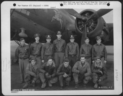 Consolidated > Crew Of The 92Nd Bomb Group Beside A Boeing B-17 "Flying Fortress" "Equipoise".  England, 23 December 1943.