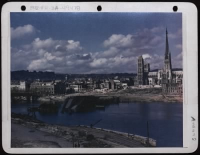 Thumbnail for ␀ > The Highway Bridge At Rouen, France, Was Hit By U.S. Planes On May 27 And May 28, 1944. The Rouen Cathedral Is In The Right Background.