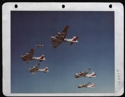 Boeing > Hovering Close To Its Charges, A P-51 Of The 8Th Air Force Practices With A Formation Of B-17S Over England.