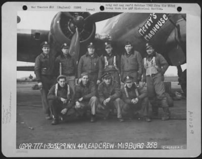 Consolidated > Lead Crew Of Bombing Mission To Misburg, Germany, Pose In Front Of A Boeing B-17 "Flying Fortress" "Mercy'S Madhouse".  359Th Bomb Squadron, 303Rd Bomb Group, England.  29 November 1944.