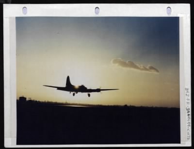Boeing > Home At Dusk:  An 8Th Air Force Fortress Comes In With Flaps Down And Appears To Hang Motionless A Few Feet Above The Runway At An 8Th Air Force Base Somewhere In England.  The Ship Has Just Returned From A Successful Mission Over Northwest Germany, And T