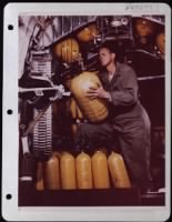 Ssgt Clifford Coates, Fairfield, Texas, Regulates Oxygen Valve Inside A Consolidated B-24. - Page 1