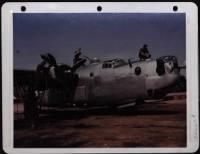 Ground Crew Checking A B-24 After A Mission. England. - Page 1