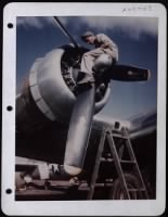 Sgt. Dave Gray, Springfield, Mass., Assistant Crew Chief, Working On Propeller. - Page 1