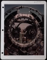 Plane View- Seen Through The Engine Cowling Ring Of A B-17 Is Msgt Harrell Parrah, Mexico, Mo  He Is Repairing The Engine Of A B-17 That Will Soon Take Off For Mission Over Germany. - Page 1