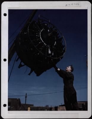 General > Reconditioning Time.....Sgt. Leslie Unruh Steadies An Engine That Has Just Been Removed From A B-17 Of The 8Th Af.  It Will Be Replaced By A New Reconditioned Engine.