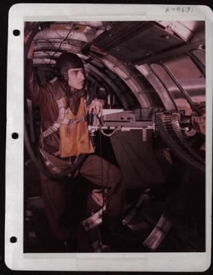 Thumbnail for Bomber > Tsgt. Mexico J. Barraza, Gunner And Radio Operator In Position At The Waist Gun Of Plane. England.