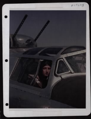 Bomber > Co-Pilot Lt. Wm. C. Rowland, New Castle, Pa., In Cockpit Of A B-24 Of The 8Th Air Force.  England.