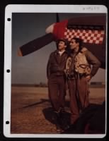 England....Captain Don S. Gentile (Right) And His Wingman First Lieutenant Godfrey, Stand Beside The Nose Of A P-51 Mustang. - Page 1