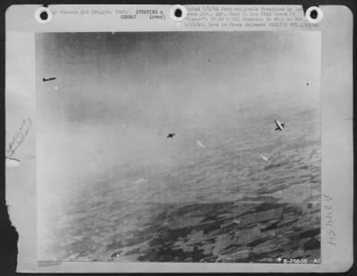Consolidated > This U.S. Army 15th Air Force B-17 bomber (right) has just lost one wing over Foggia, Italy, and two of its crew can be seen bailing out. At left is an enemy fighter plane.