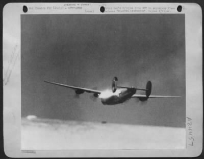 Consolidated > BLAZING LIBERATOR. Ablazing B-24 Liberator of the U.S. Army 15th Air Force, Mediterranean Allied Air Forces, fights its way home from the target against terrific odds. A few seconds after this picture was taken, the left half of the wing tore off