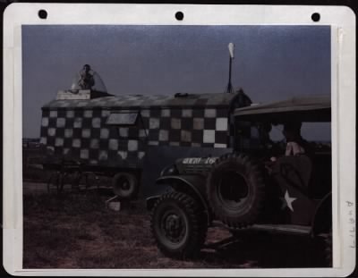 Thumbnail for NAGA Head Hunters > Cpl. Joseph F. Fox In A Salvaged B-17 Plexiglass Nose At A Base In England Flashs The Go Light To Ground Traffic Crossing The Runway.