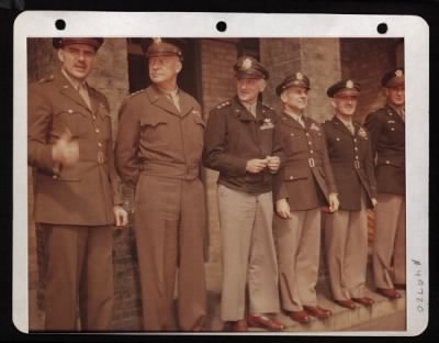 Groups > England....Brigadier General Auton, General Dwight D. Eisenhower, Lieutenant General Carl Spaatz, Major General James Doolittle, Major General Kepner And Colonel Donald J. M. Blakeslee, Taken At The Award Of The Distinguished Flying Cross To Captain Don S