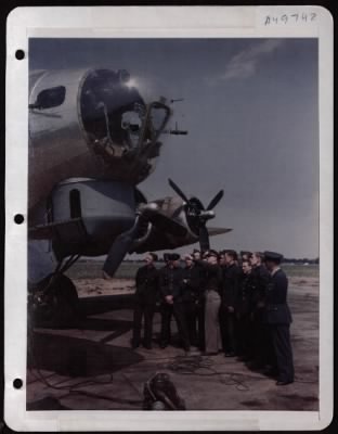 General > Capt Charles R. Mccarthy Points Out Features Of B-17 To English Air Training Cadets At A Base In England.