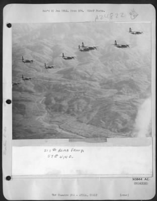 Consolidated > MARAUDERS OVER MAGRA RIVER VALLEY---With a backdrop of rugged, sharp-peaked mountains (the kind the Allies are fighting on in Italy), this formation of USAAF B-26 Marauders is on the way to bomb another vital Nazi communications target in