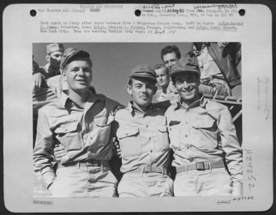 Consolidated > Back Again In Italy After Their Release From A Bulgarian Prison Camp.  Left To Right: S/Sgt Harold E. Jones, Waterloo, Iowa; S/Sgt. Charles L. Palmer, Fresno, Calif.; And S/Sgt. Louis Chused, New York City.  They Are Wearing Turkish Army Caps.  17 Sept. 1