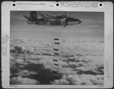 Consolidated > Bombing With The Aid Of Instruments, A 9Th Af Martin B-26 Marauder Bombardier Releases Eight 500 Pound Bombs Thru Heavy Cloud Cover During An Attack On A German Railroad Yard.  Marauders, Havocs And Invaders Of The 9Th Bombardment Division, Often Searchin