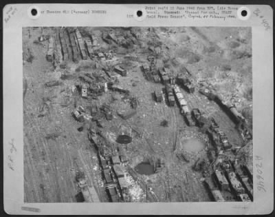Consolidated > Gouged And Pocked By Bombs From Medium And Light Bombers Of Major General Samuel E. Anderson'S 9Th Bombardment Division, This Rail Yard Near Limburg, Germany, Was Rendered Unserviceable As Part Of A Tactical Air Plan To Isolate Enemy Troops From Their Sou