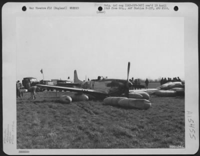 Thumbnail for Consolidated > North American P-51 'Miss Ellen' (A/C 5671) Of The 353Rd Fighter Group Came To A Stop Amid A Stack Of Auxiliary Fuel Tanks After Making A Belly Landing At Its Base In England On 15 March 1945.