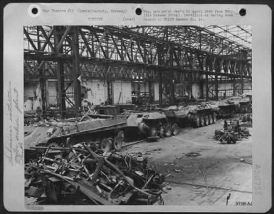 Consolidated > Before Debris From Allied Air Attacks Could Be Cleared Away From This Production Line Designed To Produce Large Panther Tanks, American Ground Troops Overran The Area.  Aschaffenburg, Germany, Tank & Submarine Plant.