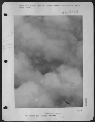 Consolidated > This Striking Aerial Photo Was Snapped By An Alert Combat Crew Cameraman Sgt. Max Shapoff Of New York City As One Of The 15Th Aaf Consolidated B-24 Liberators Crashed Somewhere In German-Held Territory.  The Ship Was Hit By Flak.  Note The Three Parachute