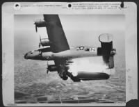 Liberator Over Italy - After Bombing In Support Of The 8Th Army Drive In Northern Italy, This B-24 Liberator Of The U.S. Army 15Th Air Force Has Been Hit By Flak And The Force Of The Explosion Has Crumpled The Wing.  The Big Plane Caught Fire And Plunged - Page 1