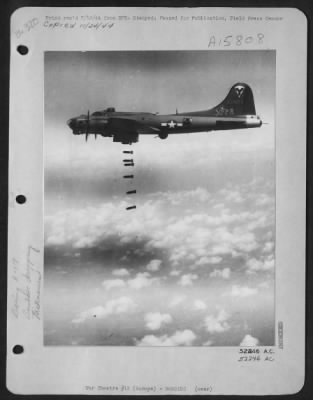 Consolidated > One of the Boeing B-17 Flying ofrtresses based in Italy releases a string of seven bombs on another enemy installation. The opposite of its name, this baby isn't joking.