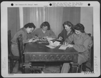 Thumbnail for Consolidated > After The Evening Meal The Day Room In The Air Wacs Billets Near Headquarters Of The 12Th Air Force In Italy Is A Favorite Hang-Out, And Letter Writing Is The Principal Occupation Of Many.  Around The Table (Left To Right) Are Pfc. Patricia Freese Of Berg