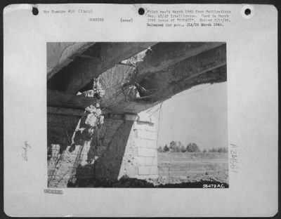 Consolidated > Span Of Highway Bridge Near Rome, Italy, Was Perforated But Not Demolished By 500-Lb Bomb[S].
