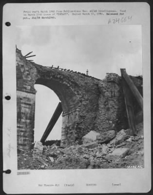 Consolidated > 1,000 Lb Bombs Did Not Entirely Demolish West Span Of This 29 Feet Wide Railway Bridge Near Ficulle, Italy.