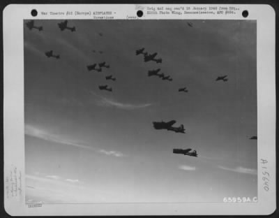 Consolidated > Lockheed P-38 Lightnings Dart In And Out Of A Large Formation Of 381St Bomb Group Boeing B-17 Flying Fortresses En Route To Bomb Enemy Installations In Europe.