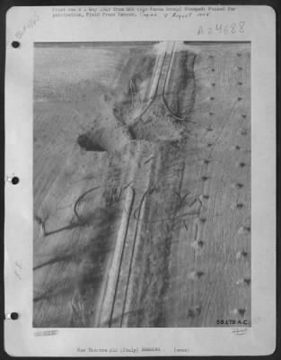 Consolidated > Spaghetti Line -- The Name Give This Much-Bombed Railroad In Northern Italy By 12Th Air Force Republic P-47 Thunderbolt Pilots.  Twin Bombs From The Wings Of P-47 Accomplished A New Twist Here, Coiling The Heavy Steel Railing Into The Shape Of A Spring.