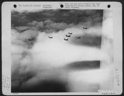 Consolidated > Europe - A Formation Of Martin B-26 Marauders Of The 34Th Bomb Squadron, 17Th Bomb Group En Route To Target In German-Occupied Territory.